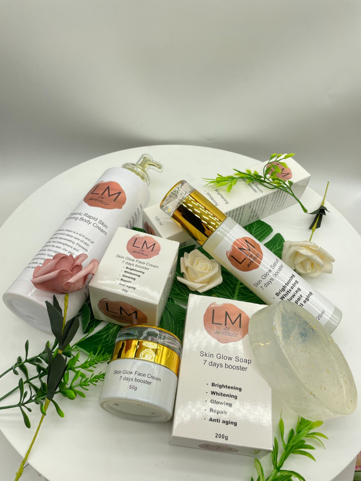 Premium La Maricell skincare range with serum, body cream, and soap.