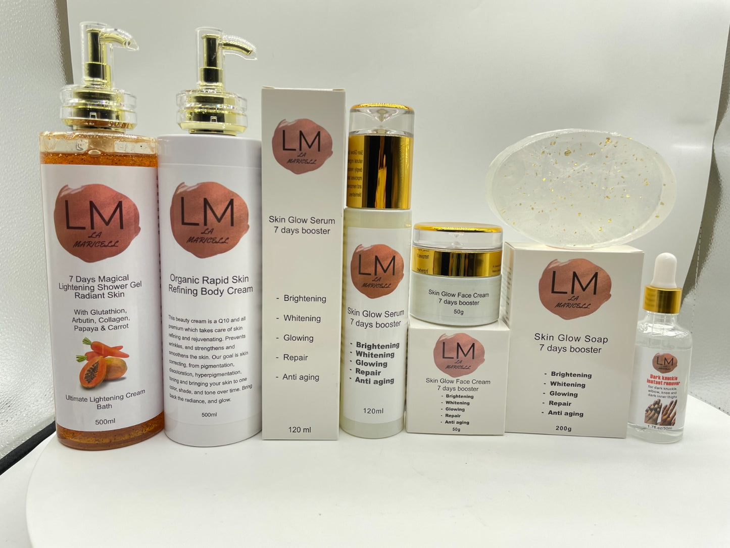 La Maricell skin glow skincare set including serum, cream, soap, and shower gel.