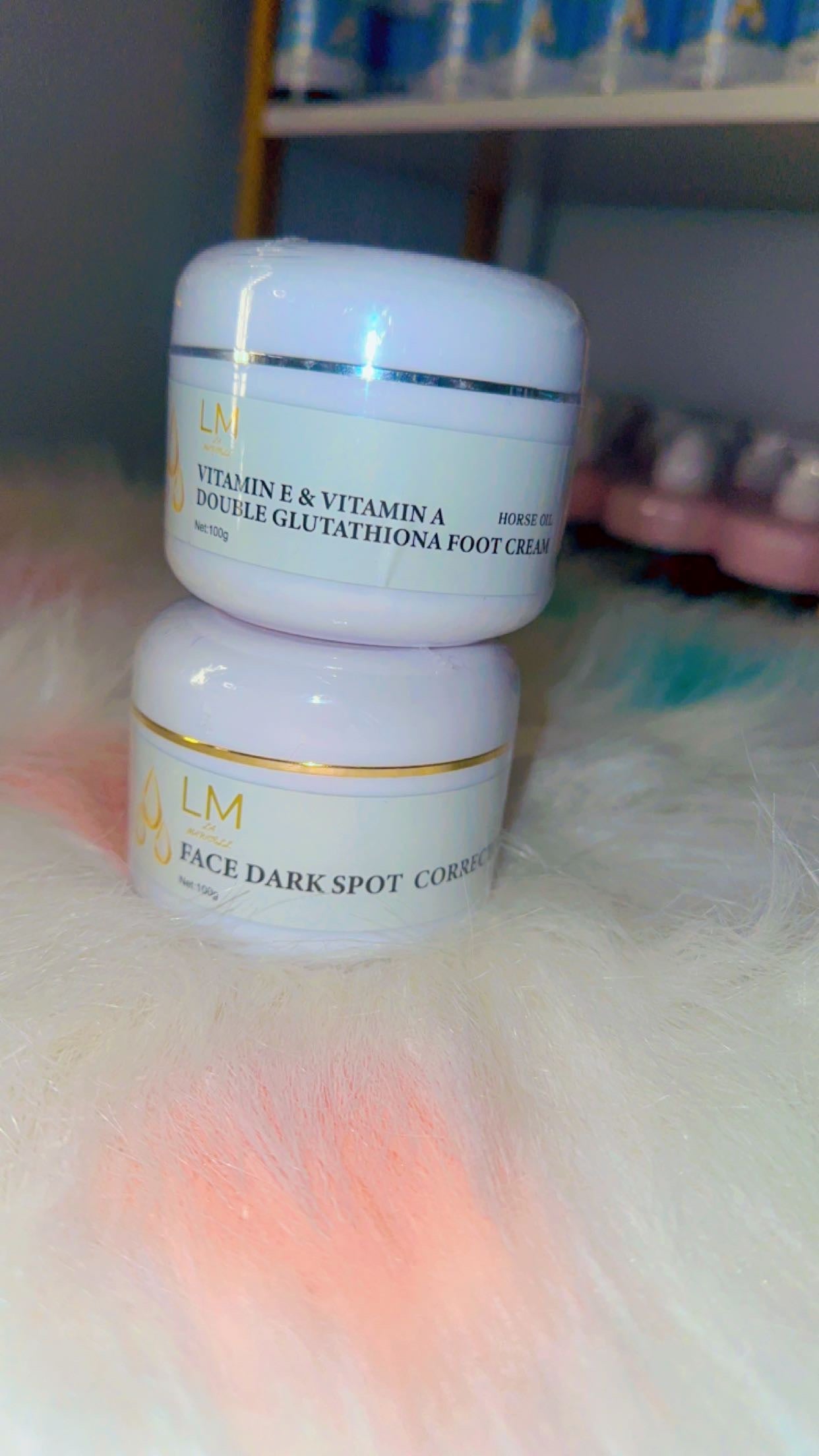 La Maricell skincare cream jars stacked on soft background.