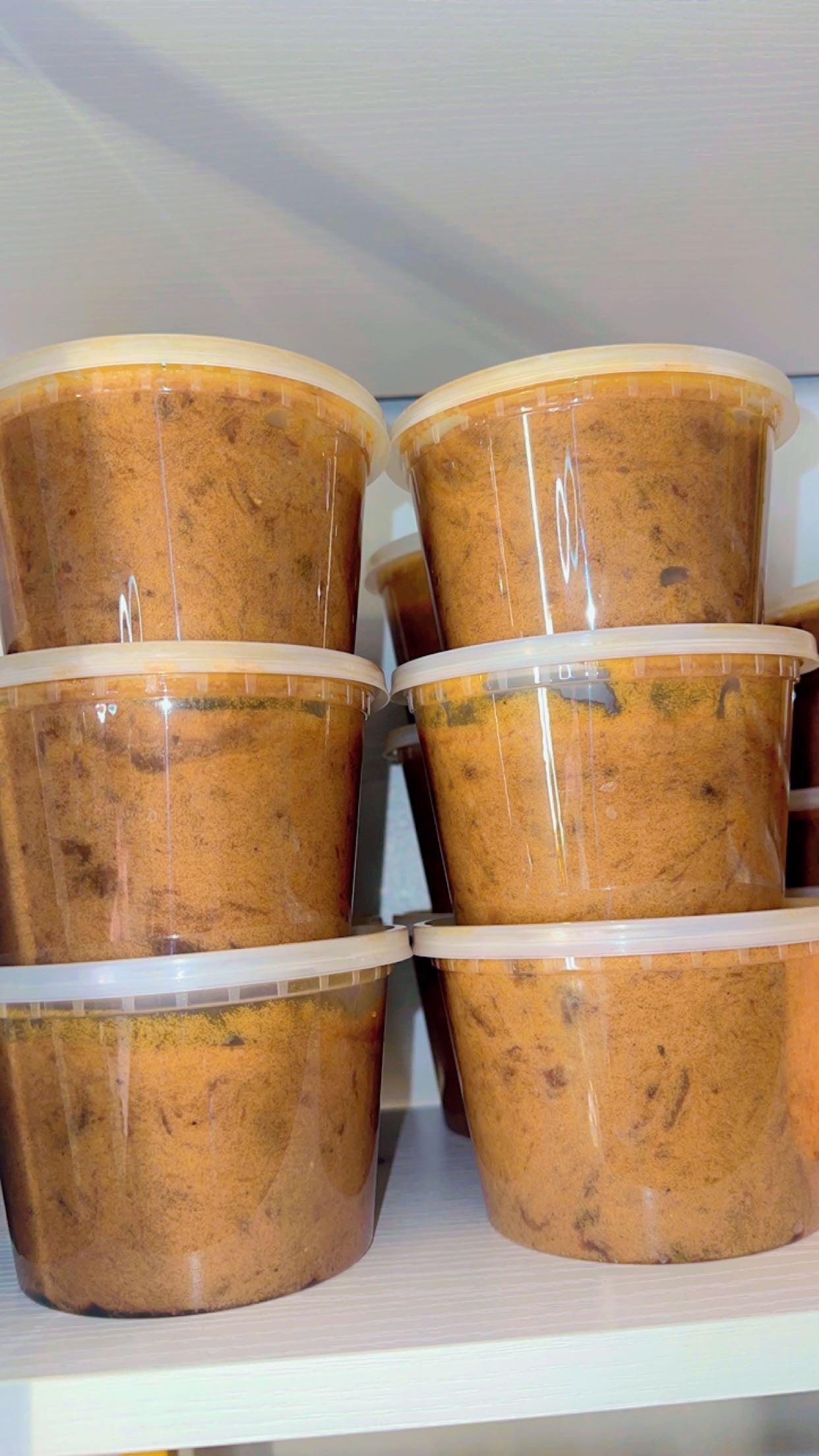 Small batch La Maricell gourmet food served in a sealed plastic cup.