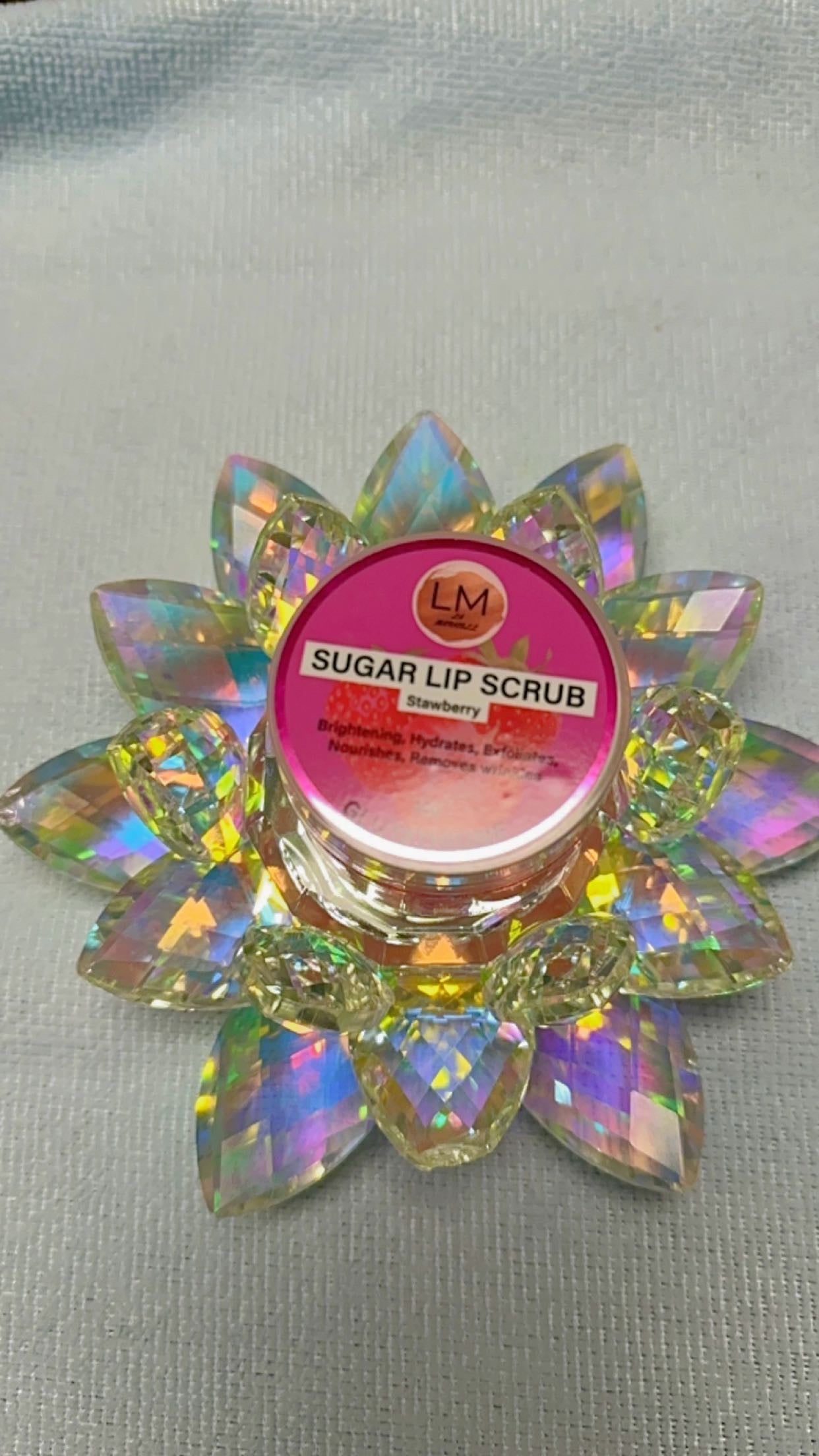 Strawberry sugar lip scrub by La Maricell shown with product boxes.