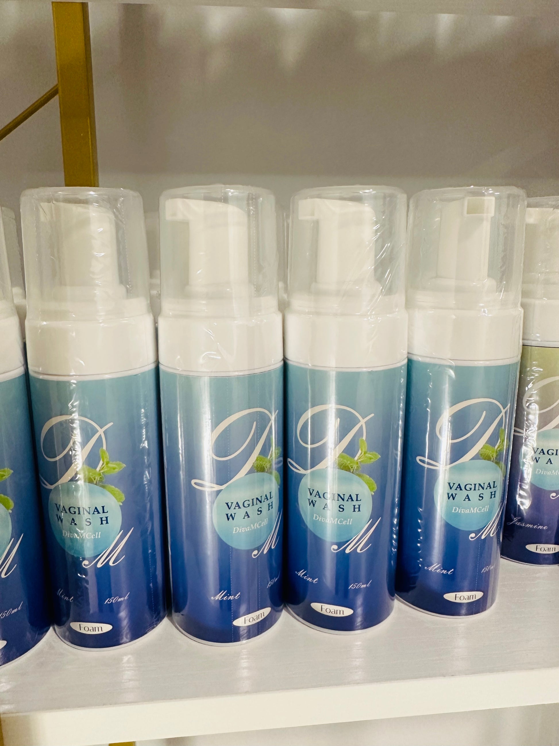 La Maricell vaginal wash foam in mint displayed on a shelf.