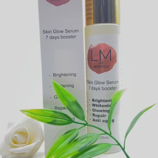 La Maricell skin glow serum bottle placed with green leaves.