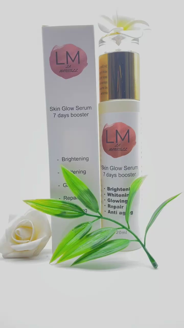 La Maricell skin glow serum bottle placed with green leaves.